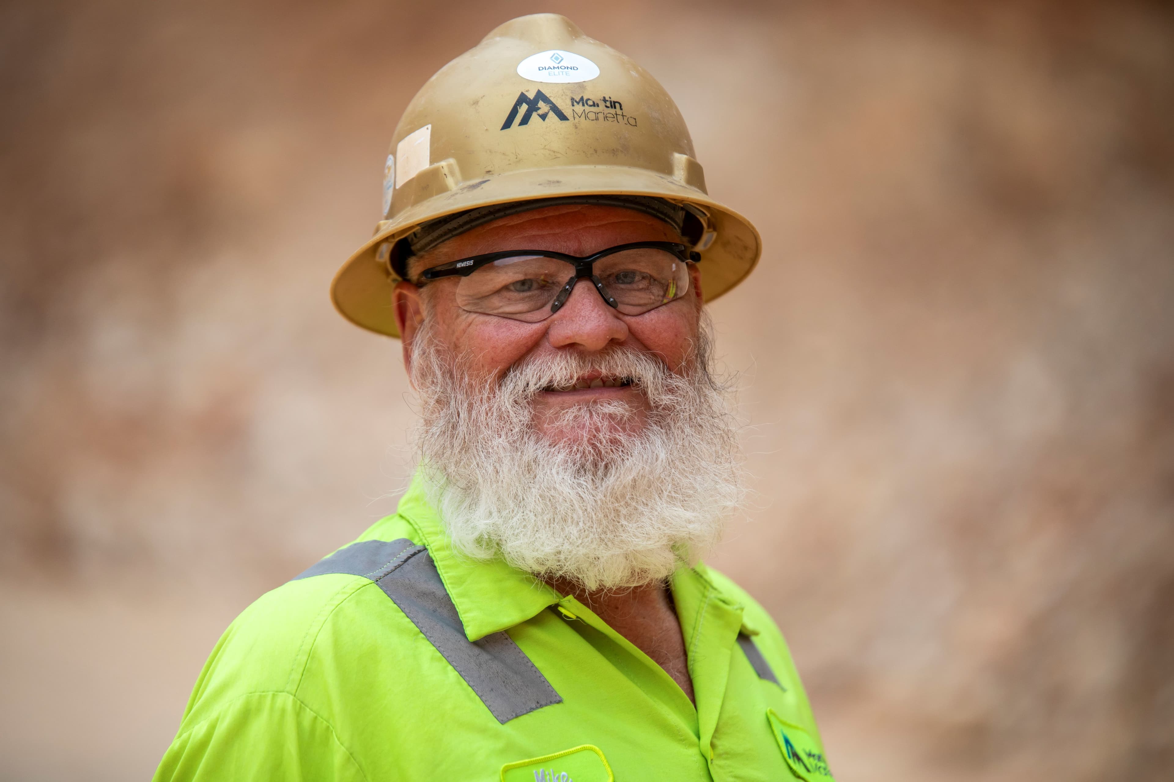 Mike Schaefer, a dozer operator at Hunter Stone, starts growing out his beard in the summer so he can have full white whiskers by winter to dress as Santa.