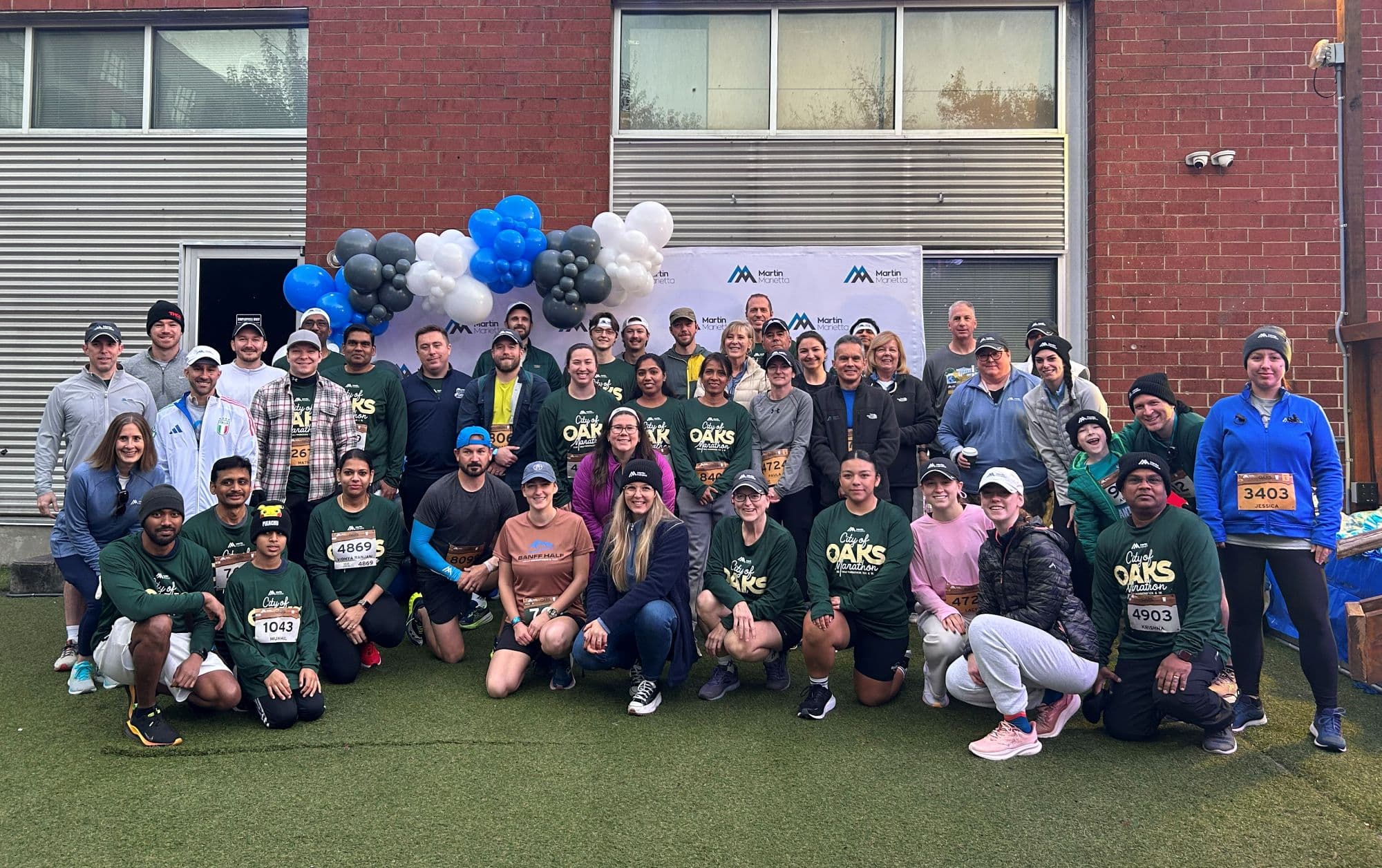 A group of Martin Marietta runners, volunteers, friends and family get ready for an action packed race day.