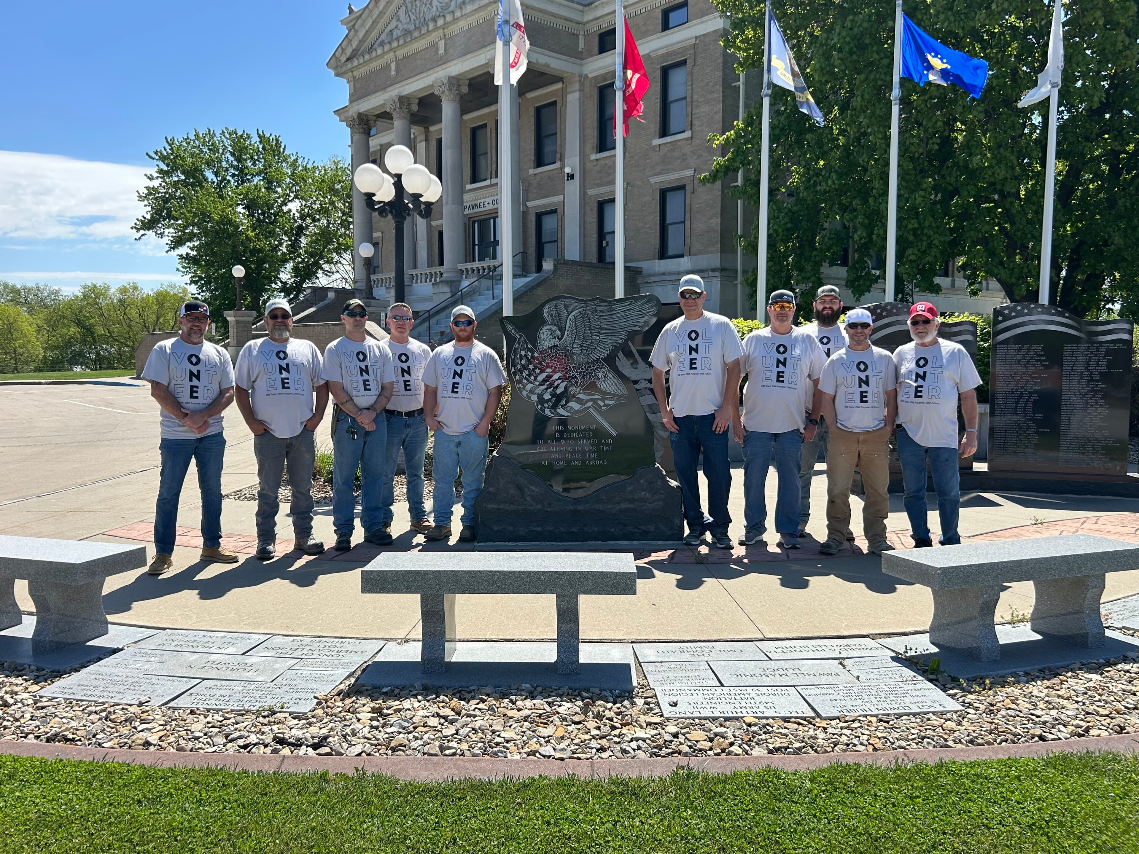 Volunteers from Martin Marietta’s helped install new flagpoles at the Pawnee County Courthouse.