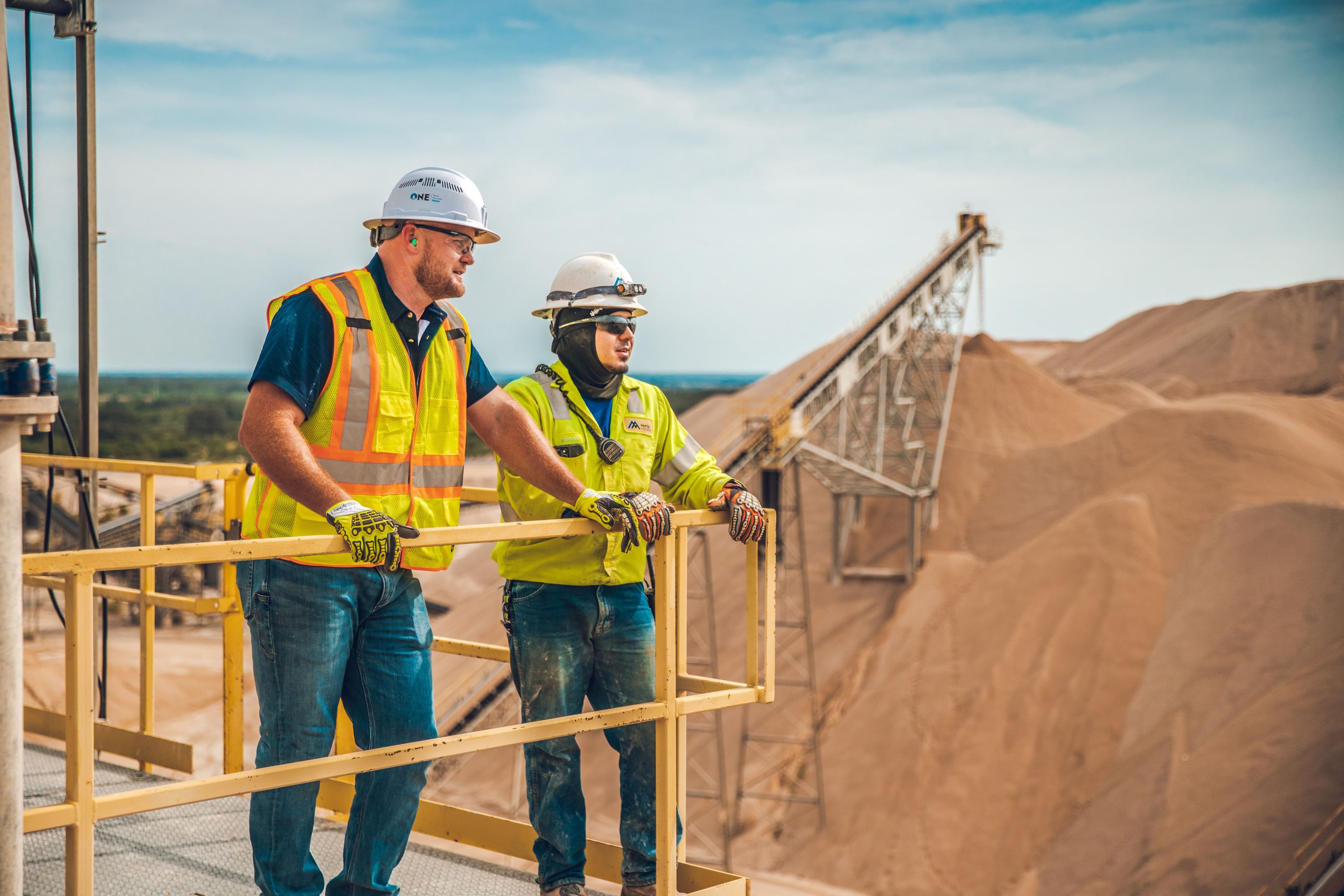 Plant Manager Patton Gilliam (left) inspects the site from above.