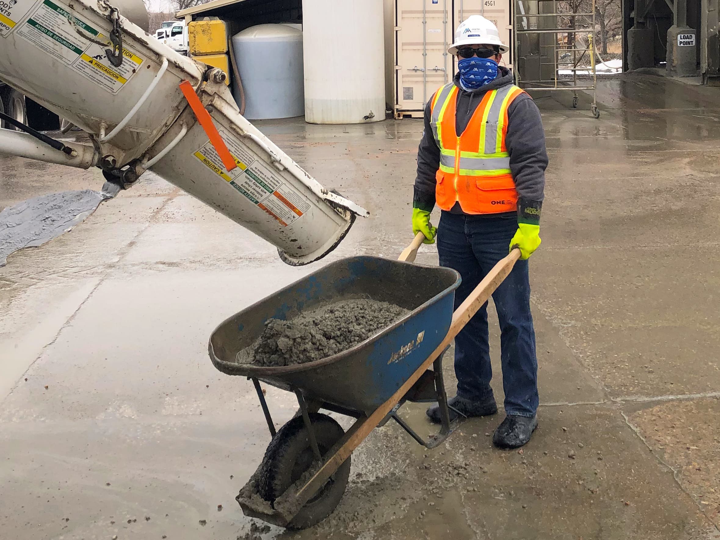 Quality Control Technician Claudio Rubio samples and tests concrete at the Valmont Ready Mix Plant in Boulder, Colorado.