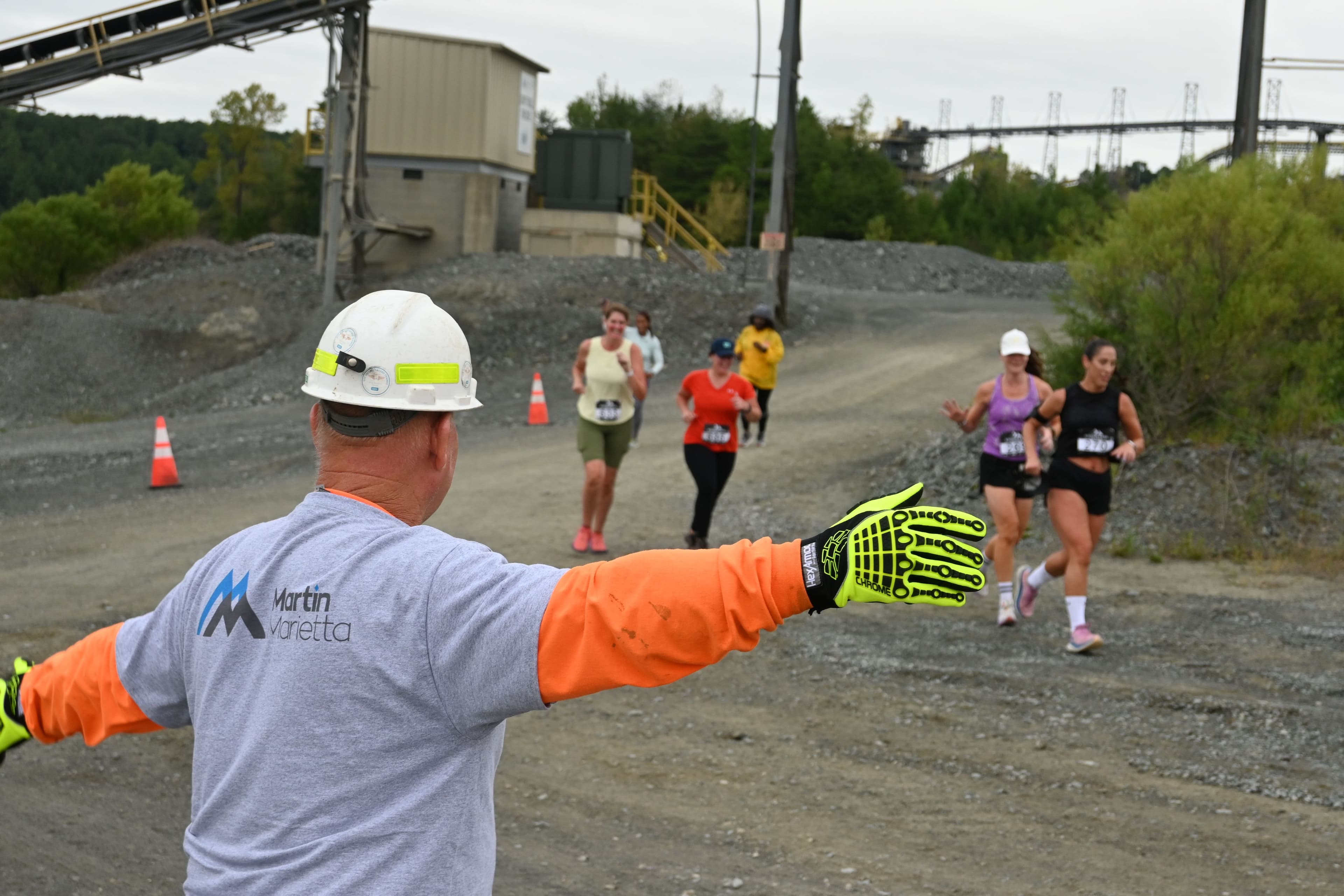 Martin Marietta crew members guide runners on their journey through Charlotte Quarry.