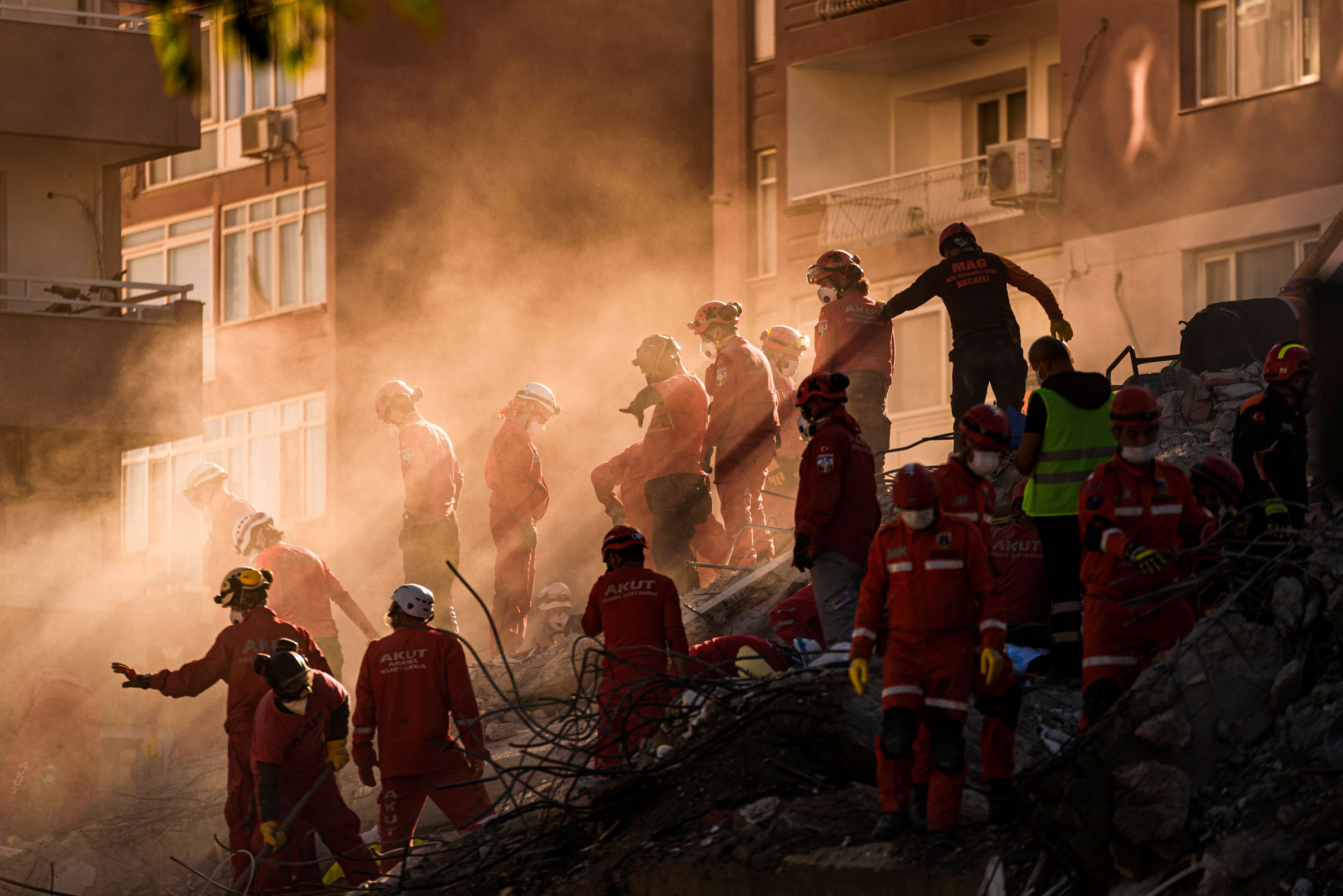 A group of search and rescue volunteers seeks out people after a disastrous earthquake hit Turkey on Feb. 6. photo credit: Shutterstock