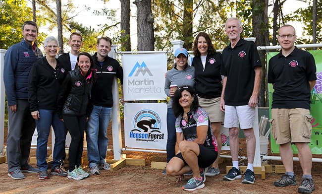Anne Bari (kneeling) represents Martin Marietta at le Tour de Femme.