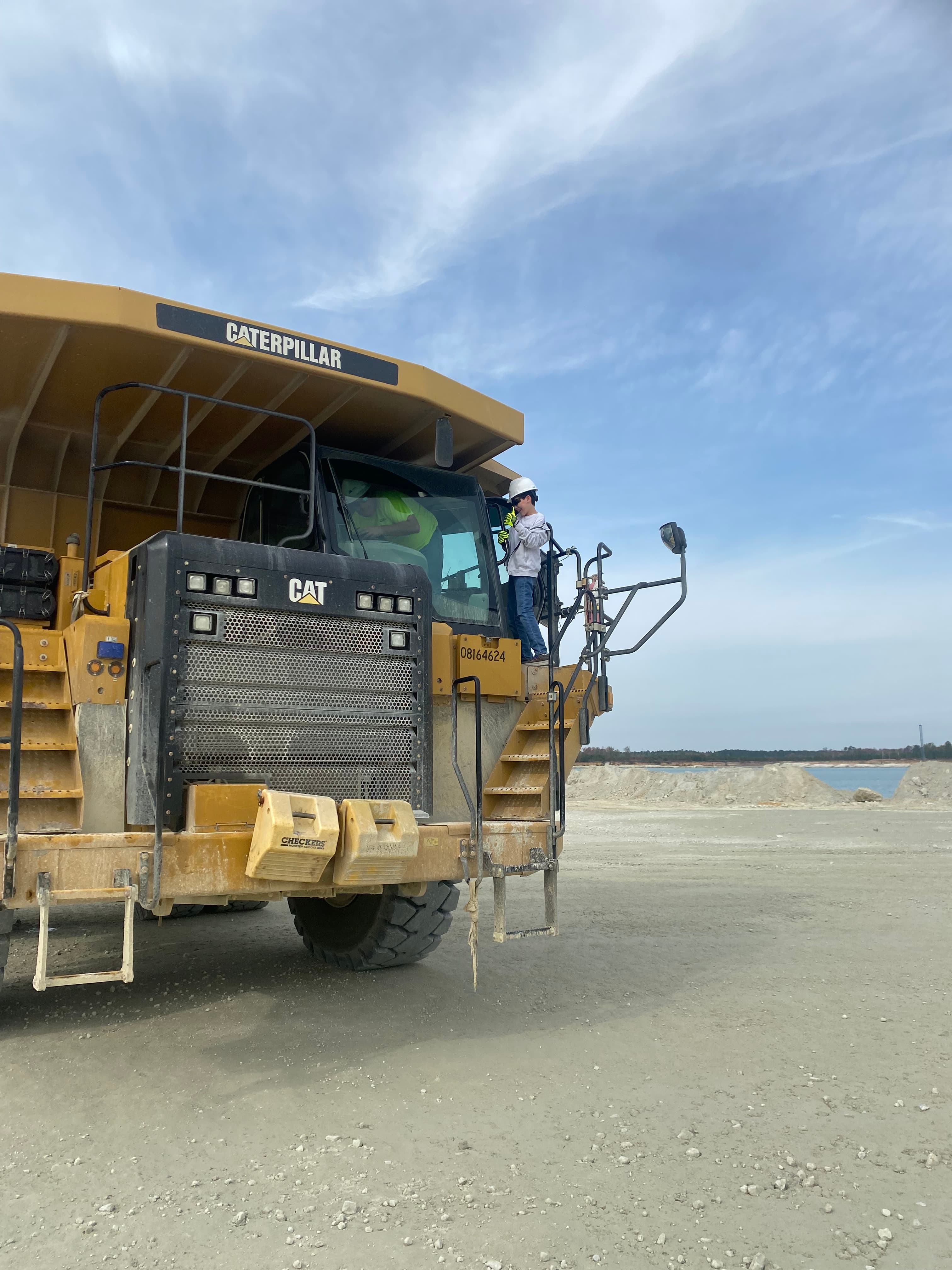 As a part of a special experience, Grayson Osborne, a Charleston Christian School student battling brain cancer, got to ride in a haul truck at Berkeley Quarry