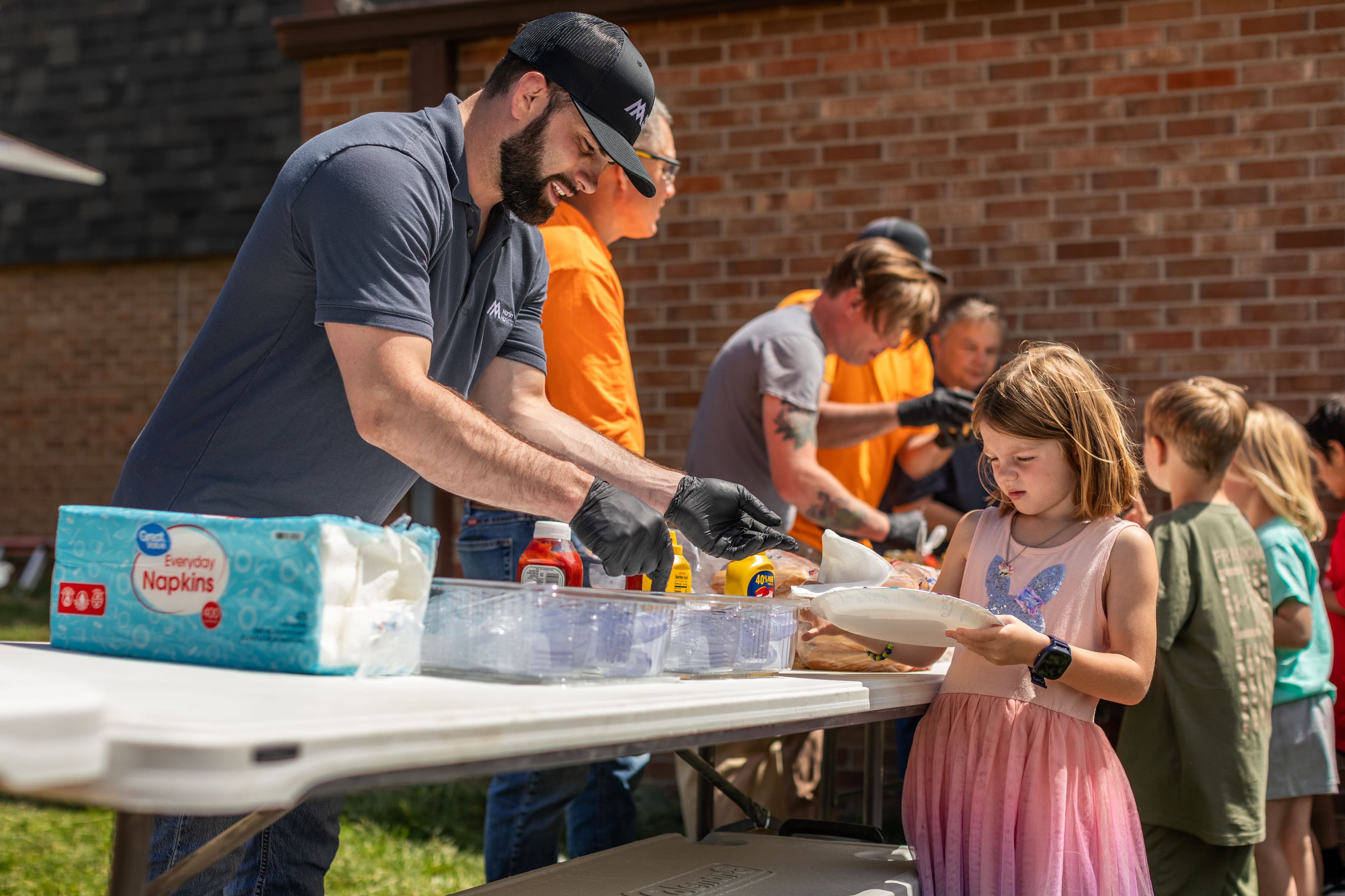 The Ames Mine crew volunteers at the Boys & Girls Club of Story County to feed the area’s children in need.