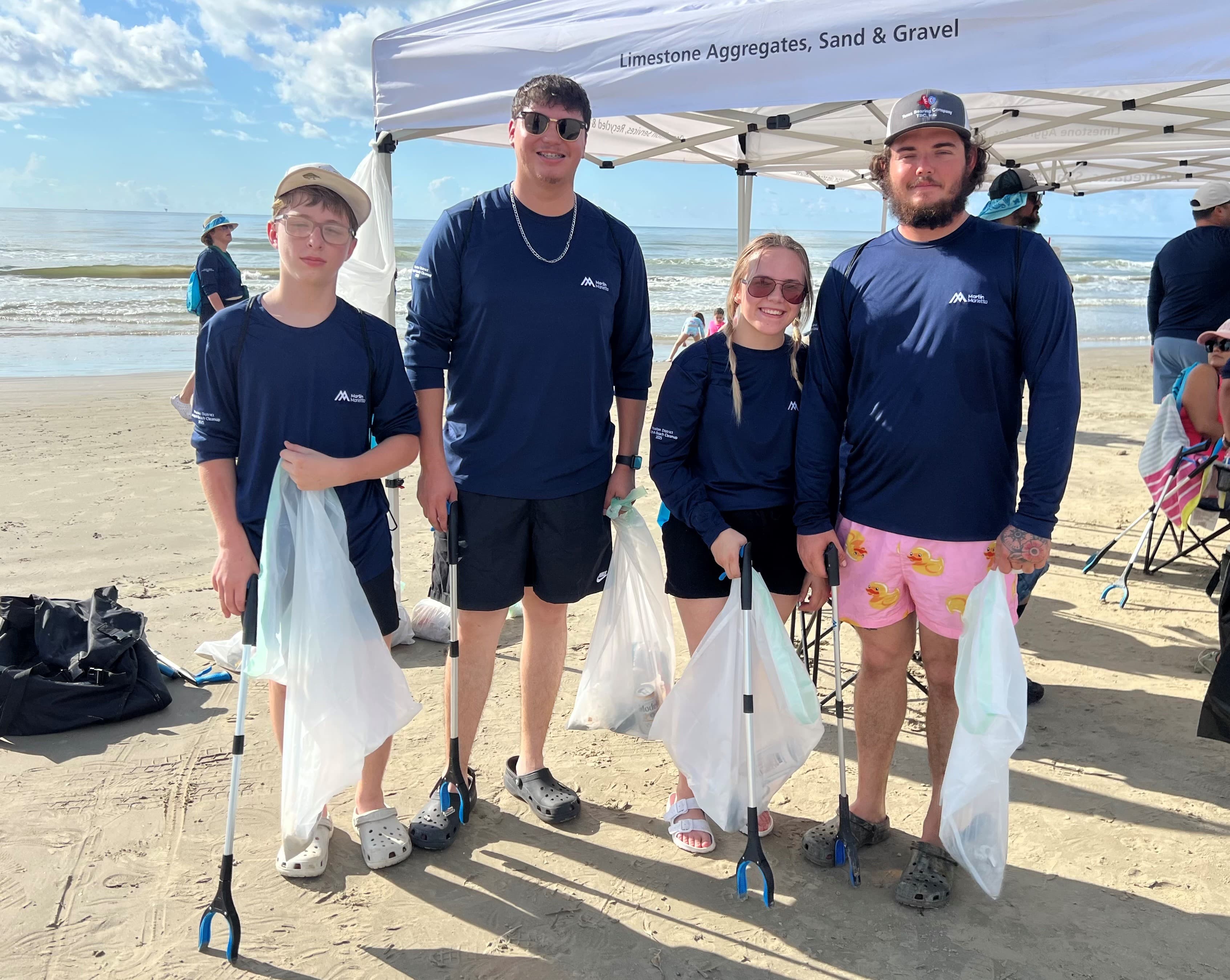 Volunteers collect debris along the sand, turning small efforts into big environmental impact. Trash bags in hand, teams worked together to remove harmful litter from the shoreline.