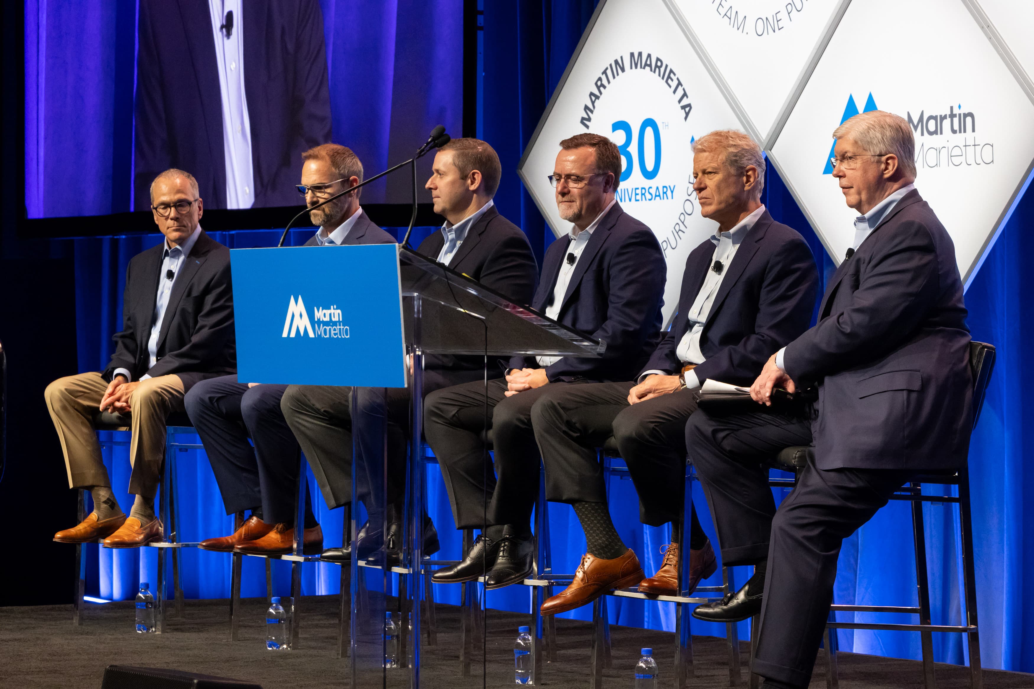 Chairman and CEO Ward Nye (right) fields questions about the past, present and future of the company along with division presidents, from left to right, Ron Kopplin, Bill Podrazik, Chris Samborski, Kirk Light and Abbott Lawrence.